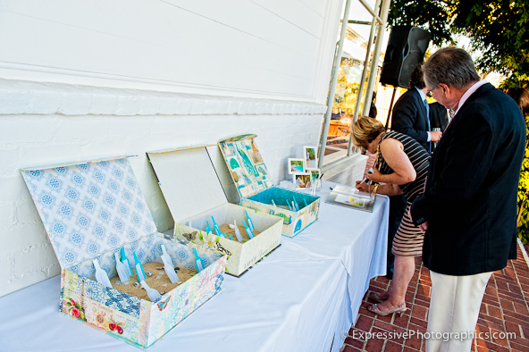 guest table tags in sand boxes